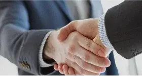 casual business handshake.webp